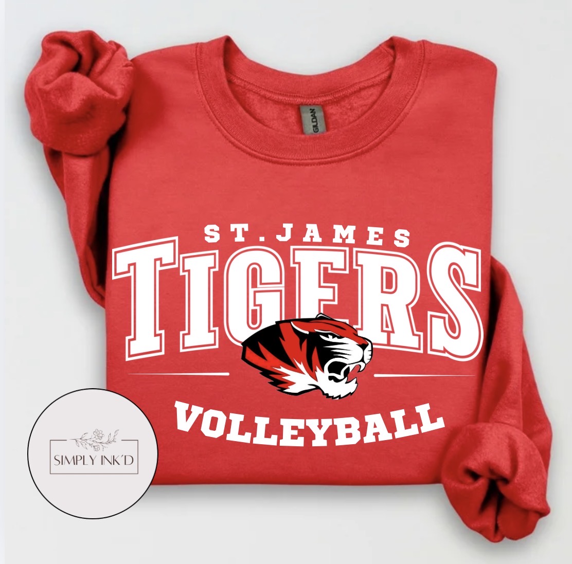 St. James Tigers Volleyball design on a red crewneck sweatshirt