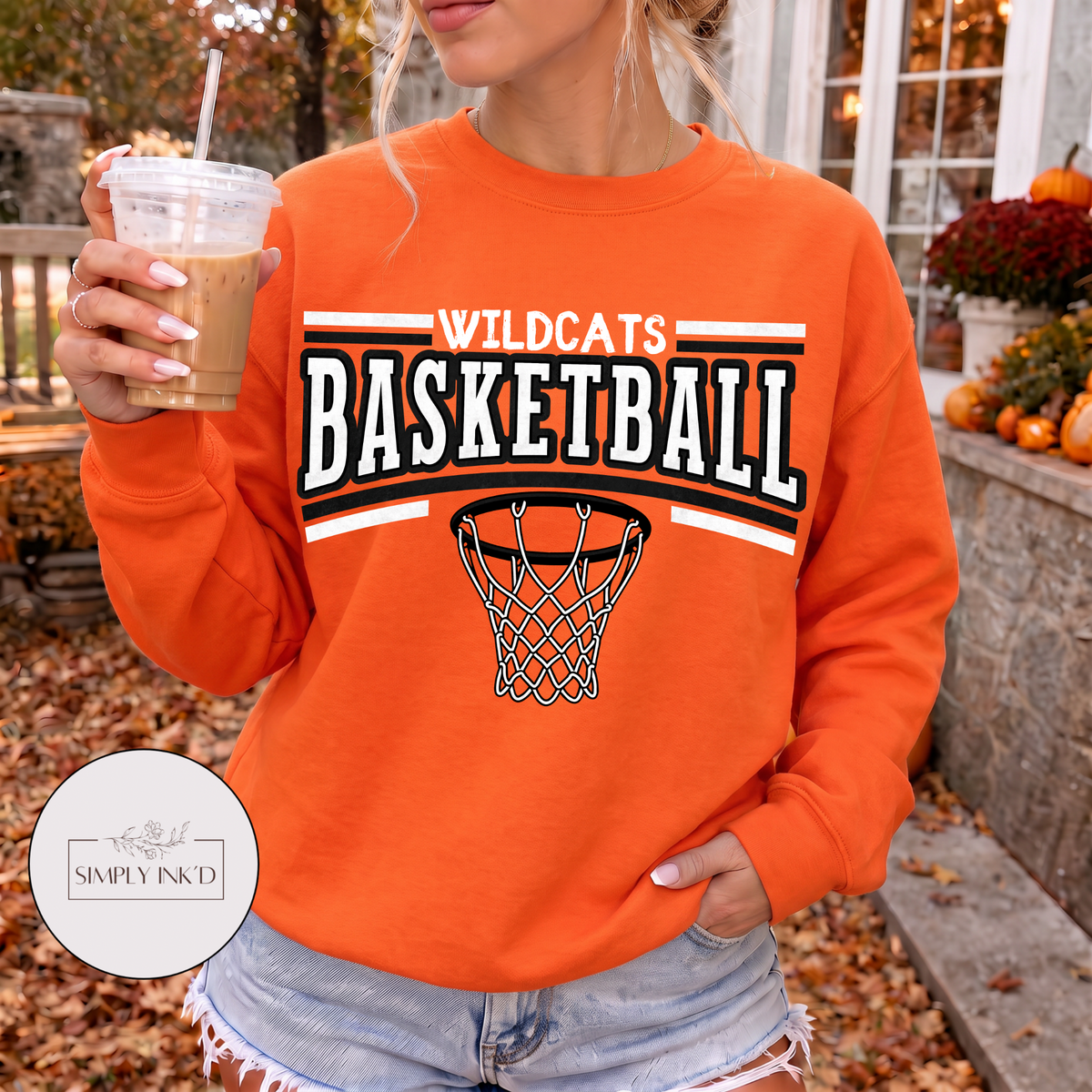 Licking Wildcats Basketball design shown on an orange crewneck