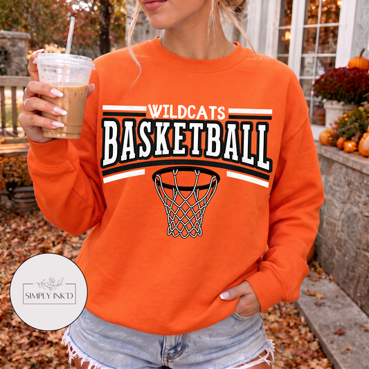 Licking Wildcats Basketball design shown on an orange crewneck