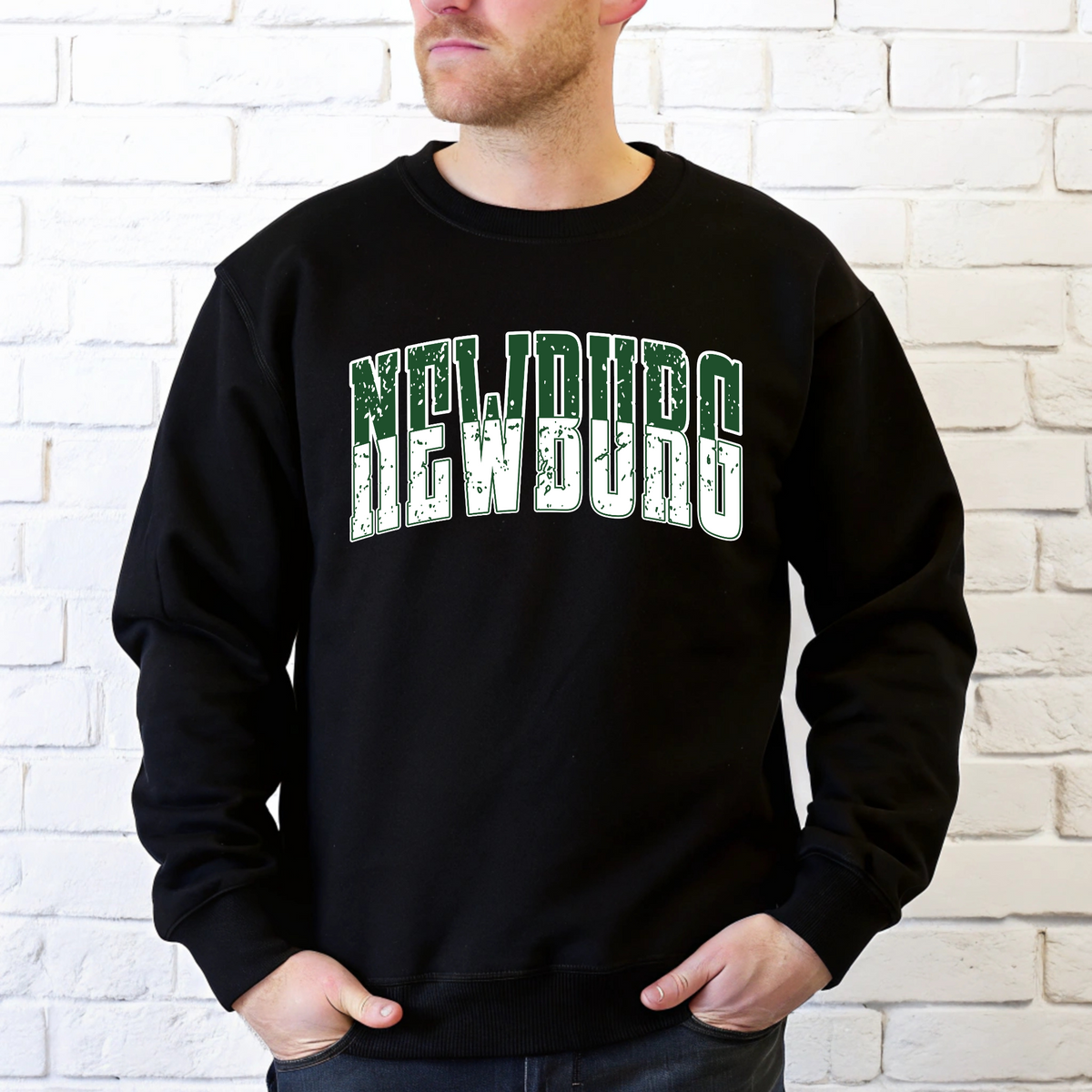 Green and white distressed NEWBURG varsity lettering shown on a black crewneck