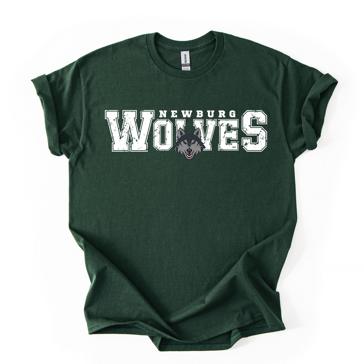 Distressed white Newburg Wolves lettering and wolf mascot on a forest green T-shirt