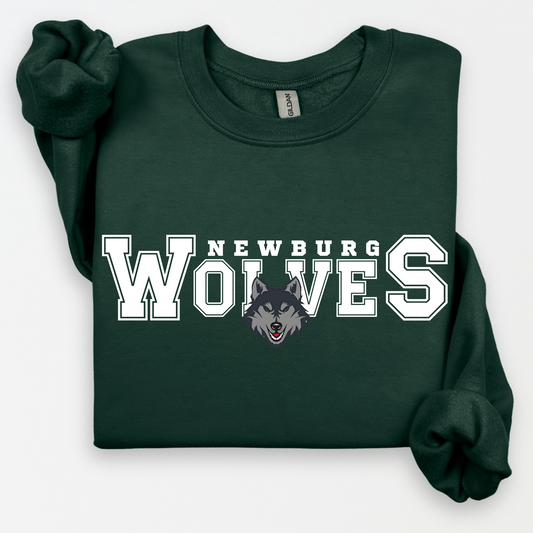 Newburg Wolves Varsity Pride design shown on a forest green crewneck