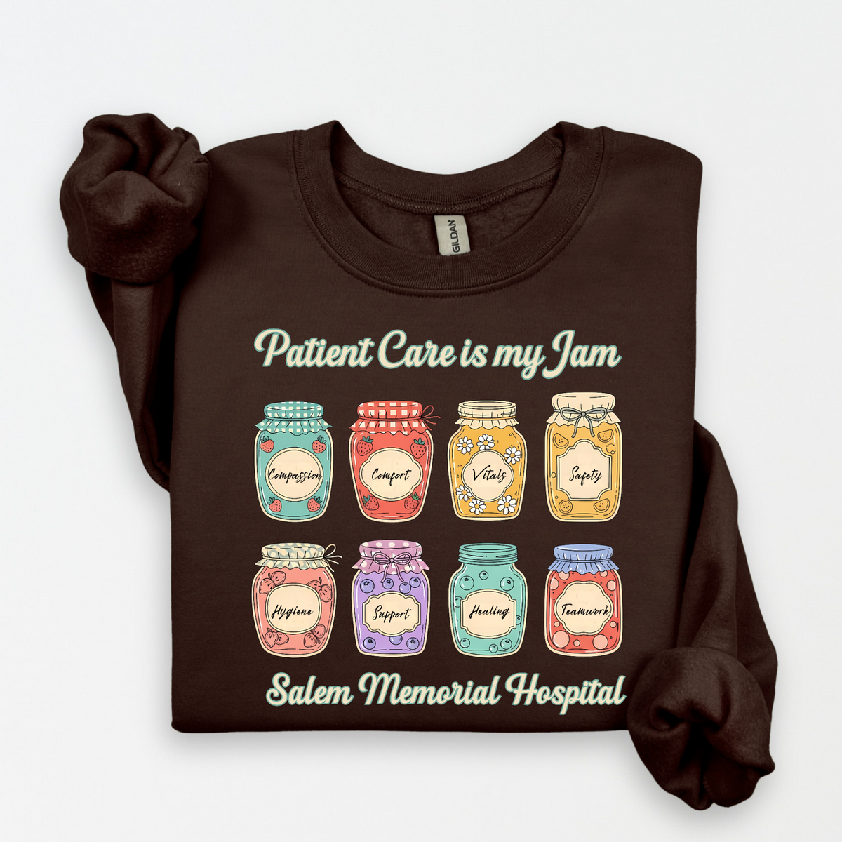 Patient Care Is My Jam colorful jars design with Salem Memorial Hospital lettering on a dark chocolate crewneck sweatshirt