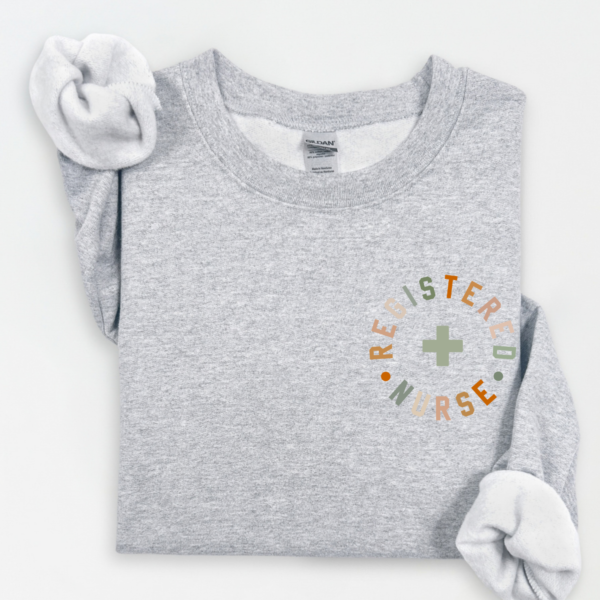 Registered Nurse left chest design on Sport Grey Gildan crewneck