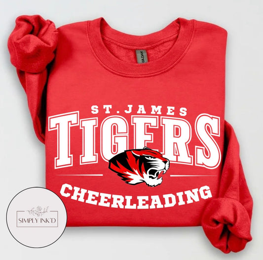 St. James Tigers Cheerleading design on a red crewneck sweatshirt