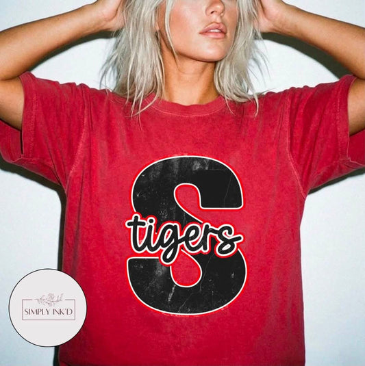 St. James Tigers S Monogram shown on Comfort Colors Crimson T-shirt